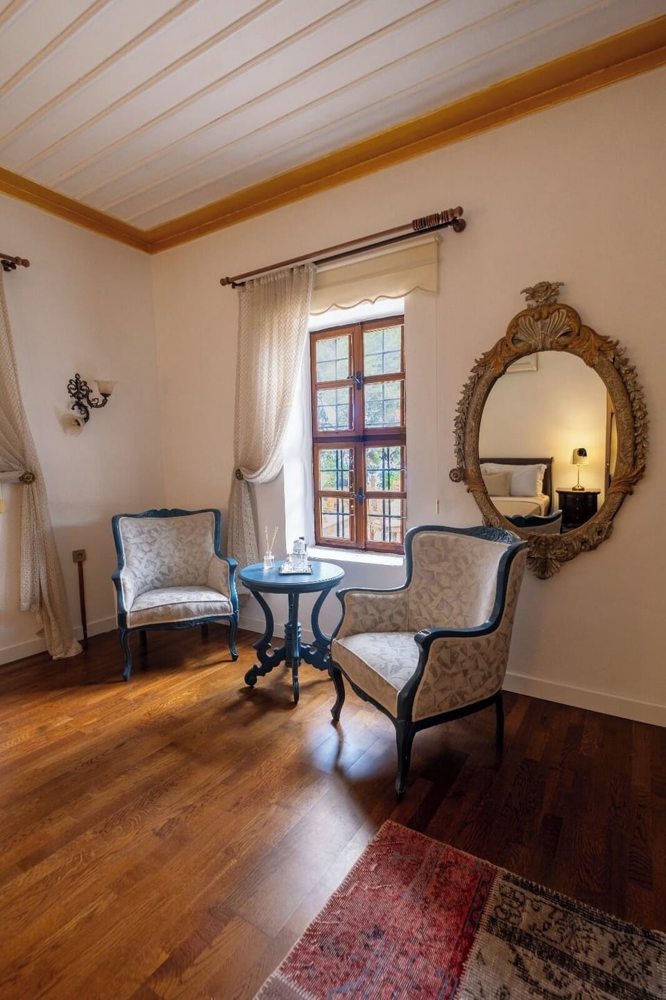 Comfort Quadruple Room, Garden View | Living area