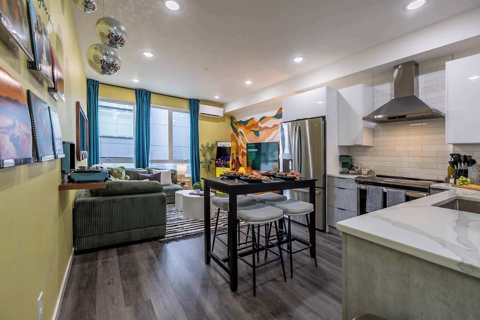 From the disco balls to the Pac-Man machine, this open-concept space brings the fun. Cook, chill, play, or pose for a selfie—this spot is made for hanging out and making memories. 