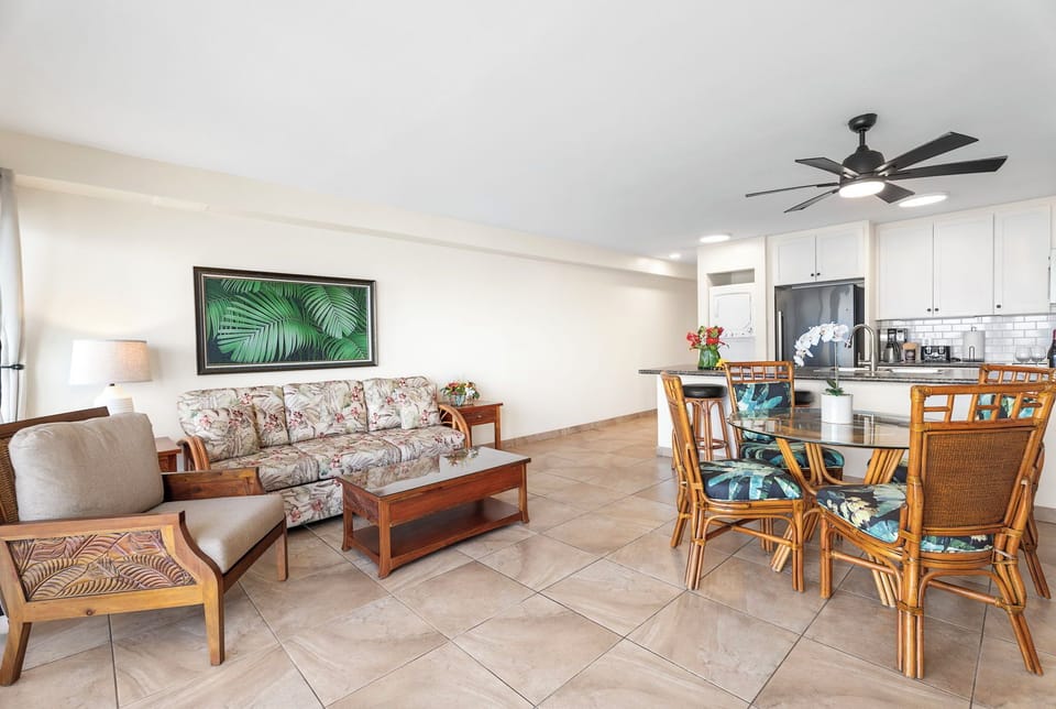 Spacious and sun-filled layout, connecting living, dining, and kitchen areas for easy vacation living.