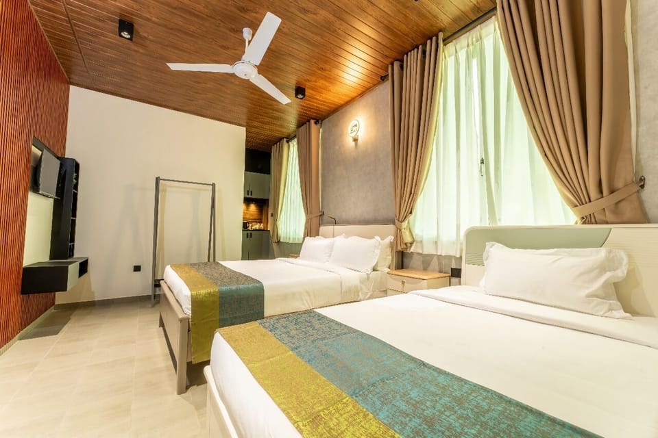 Deluxe Triple Room, Balcony, Garden View | Free WiFi