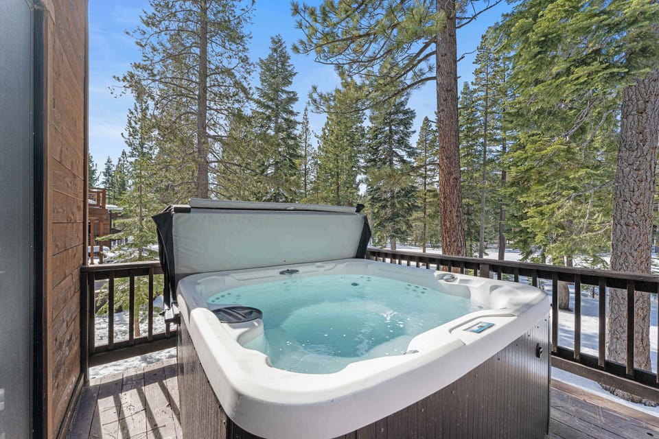 4-6 person hot tub located on lower level back deck.  Overlooks the private backyard and 2nd fairway of Tahoe Donner's prestigious golf course,