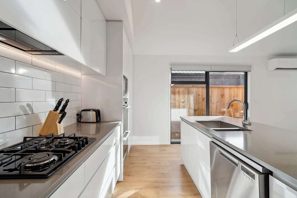 Fully stocked with oven, gas stove, microwave, and more.