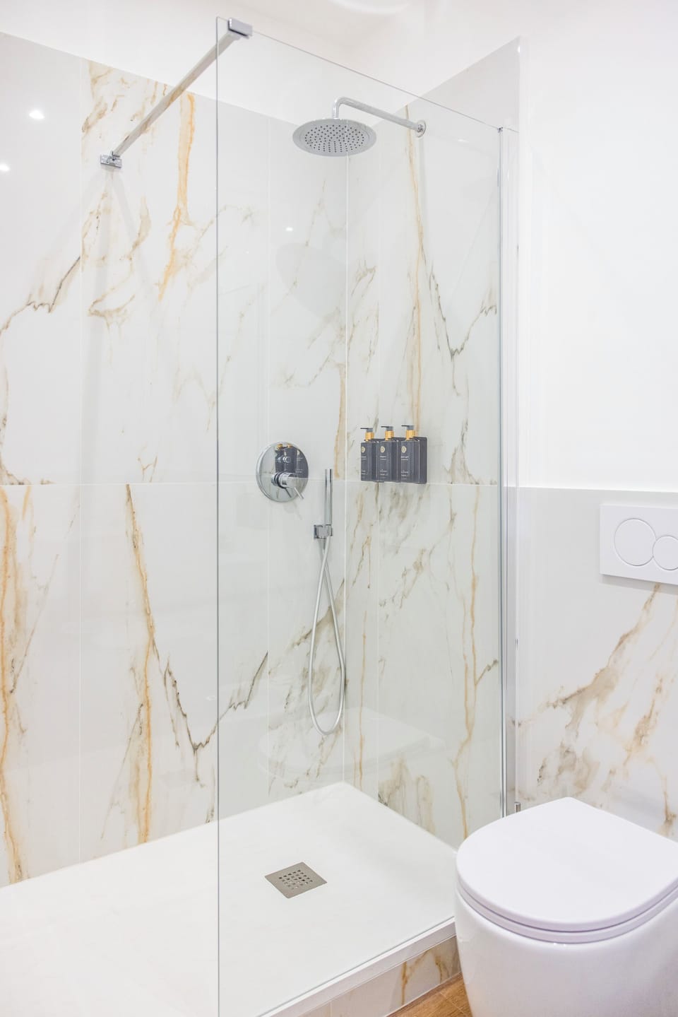Shower, free toiletries, hair dryer, slippers