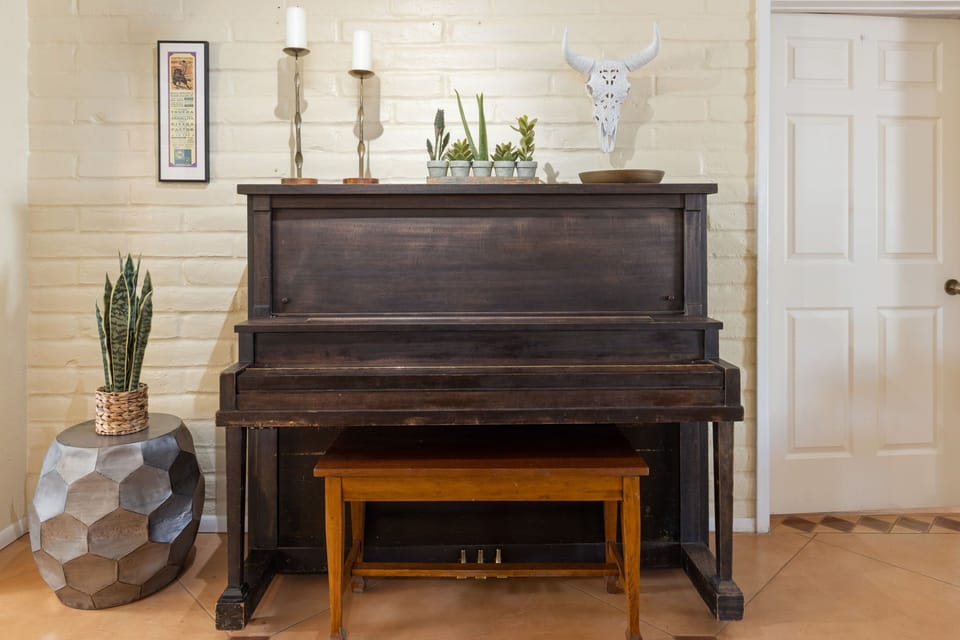 Create memories at the family piano—play a song for everyone.