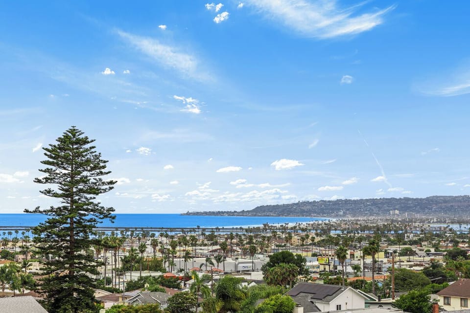 Take in 180° panoramic ocean views from your private balcony at The OB Overlook.