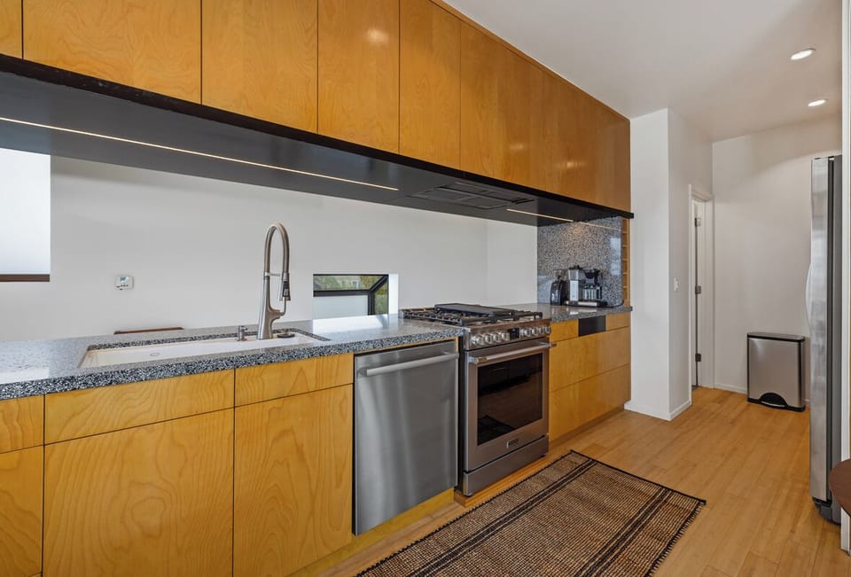Food prep made easy with a chef's kitchen. Coffee bar for those needing a fix.