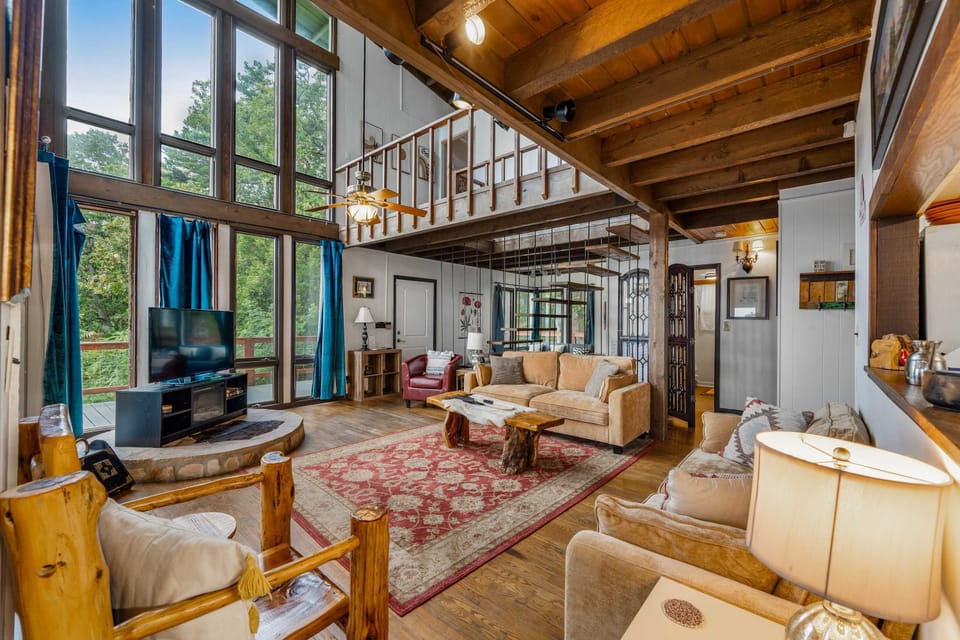 Living Room with Large Windows Overlooking the Mountains