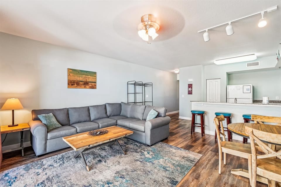 living room with plenty of seating to watch some tv or have a meal