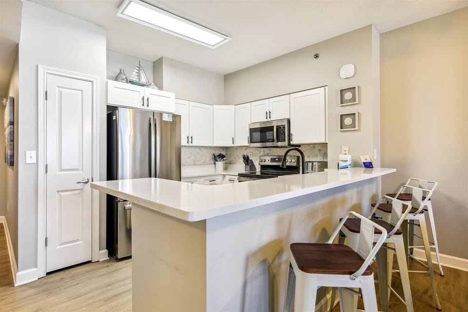 Kitchen with bar seating for 4