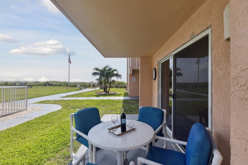 Private patio with outdoor dining table seats four