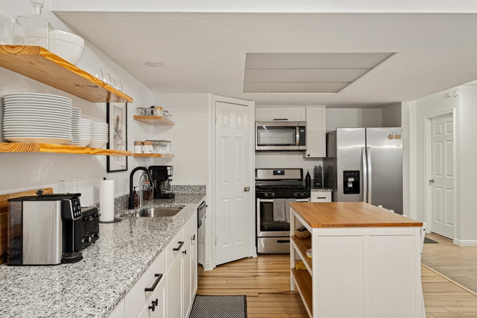 The kitchen is fully stocked with everything you may need - no food or drink.