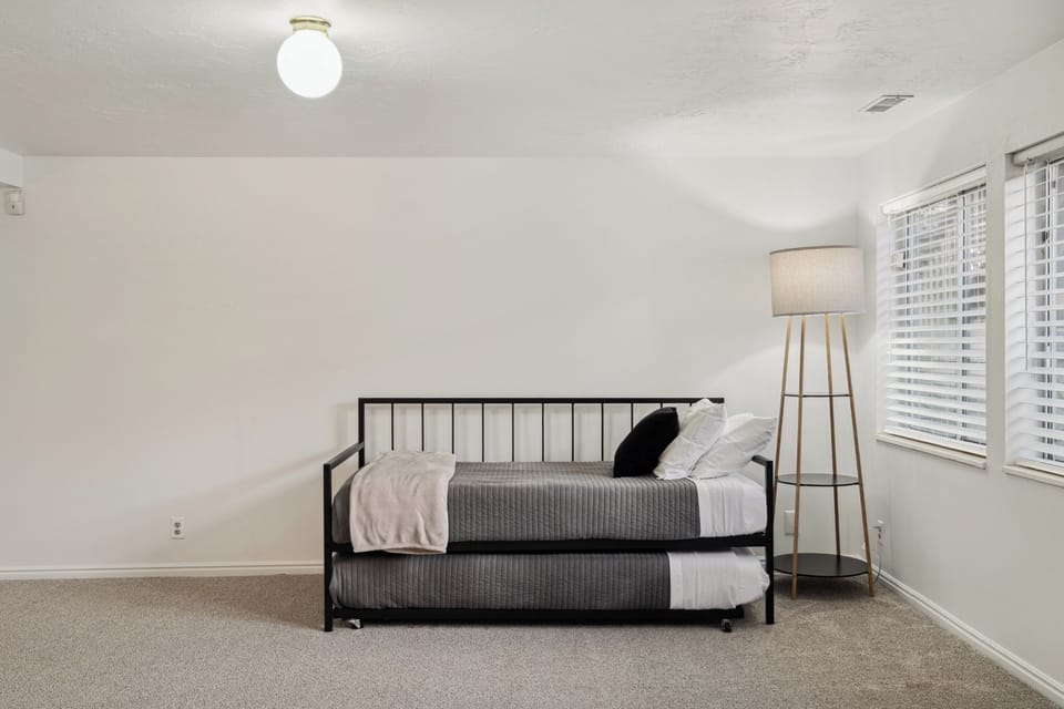 An additional Twin Bed and Trundle Bed is located in the basement common area.