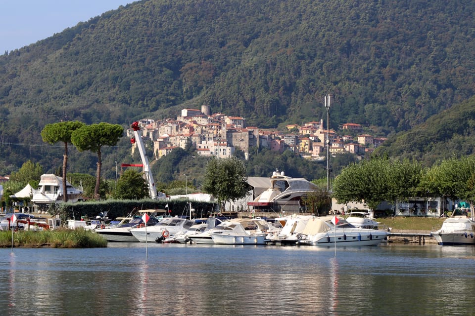 The river Magra with the village of Ameglia in the background