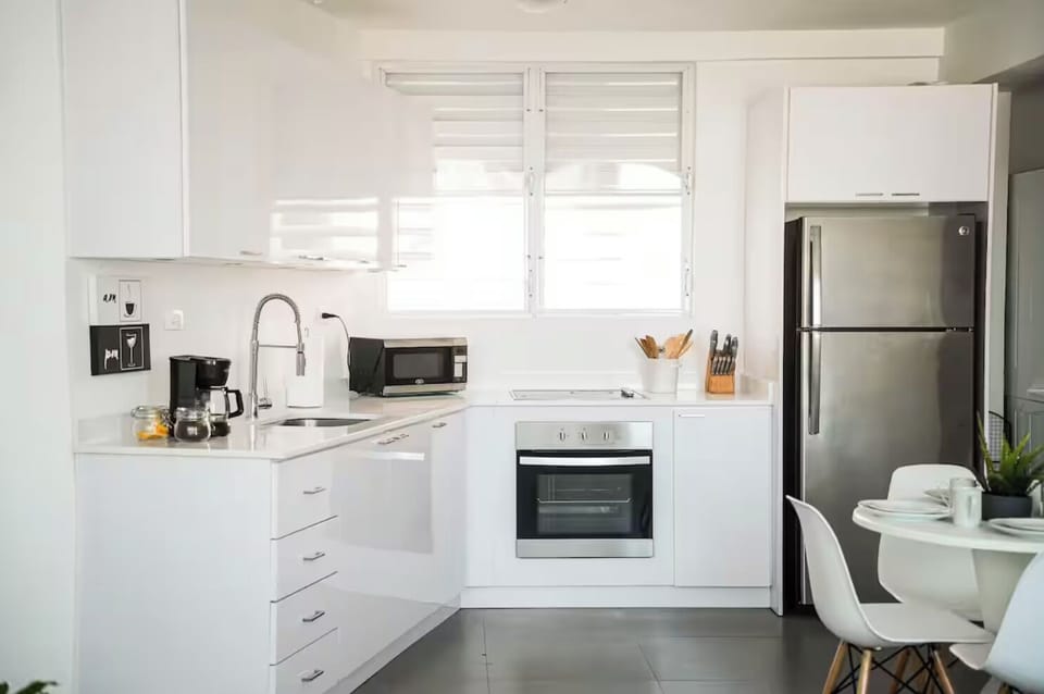 Fully equipped kitchen that's ready for you to make your meals together.