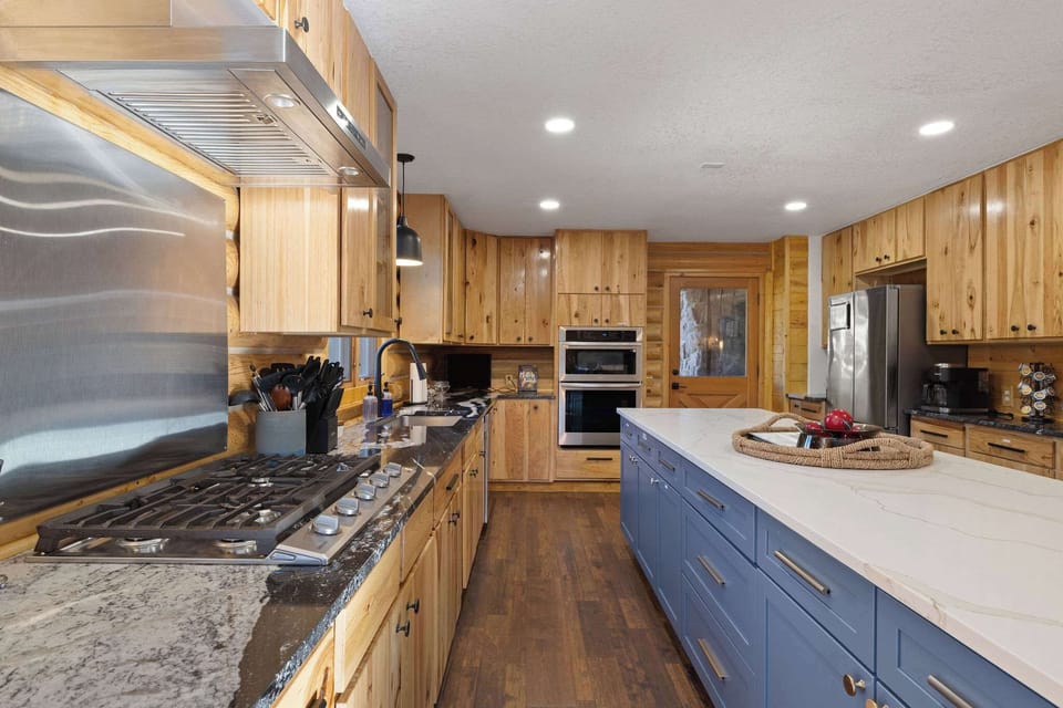 Enjoy the updated, stainless steel appliances including a dishwasher, refrigerator, microwave, oven and gas stove top. 