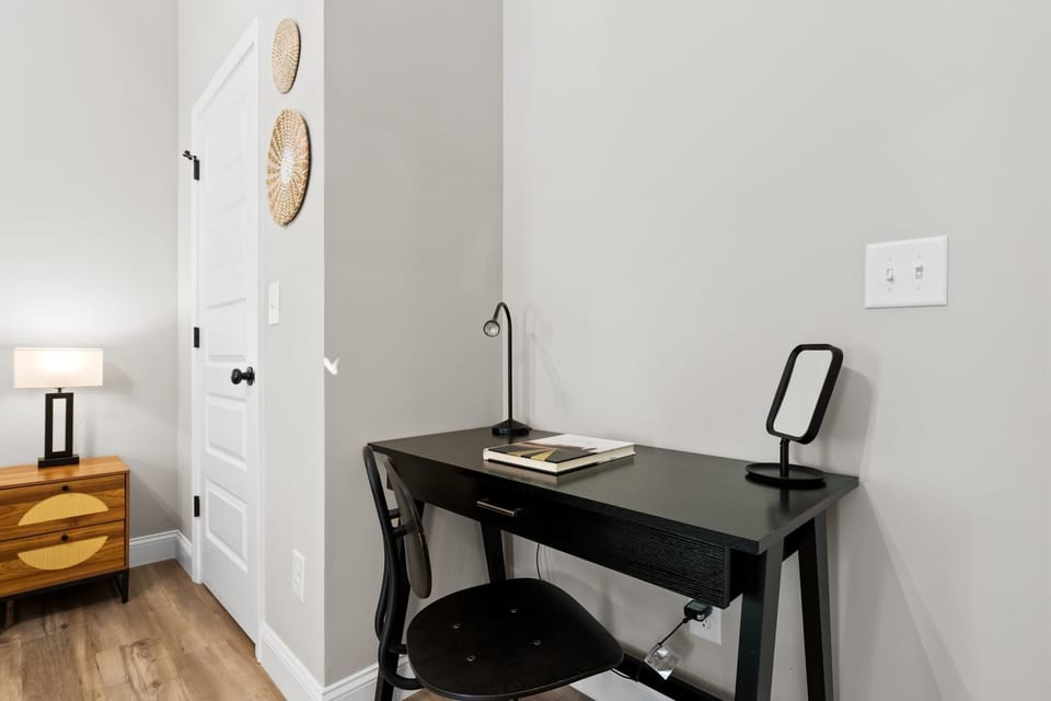 Whether you're working remotely or getting ready for a night out, this flexible nook functions as a workspace or vanity.