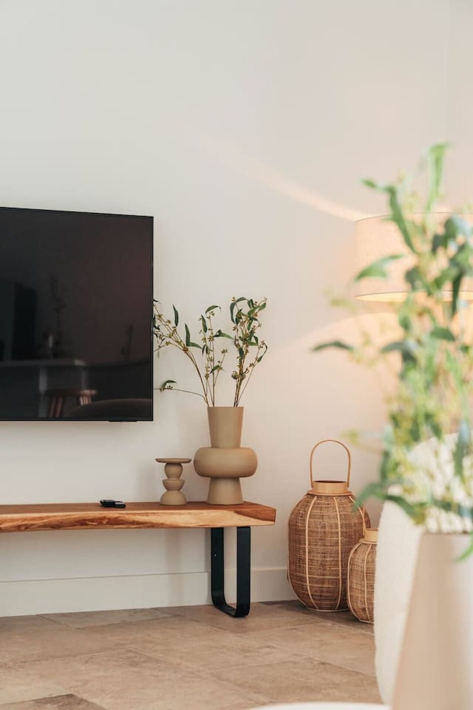 Cozy corners like this make you feel right at home—natural textures, warm lighting, and just the right touch of style. Perfect for slow mornings or lazy evenings in.