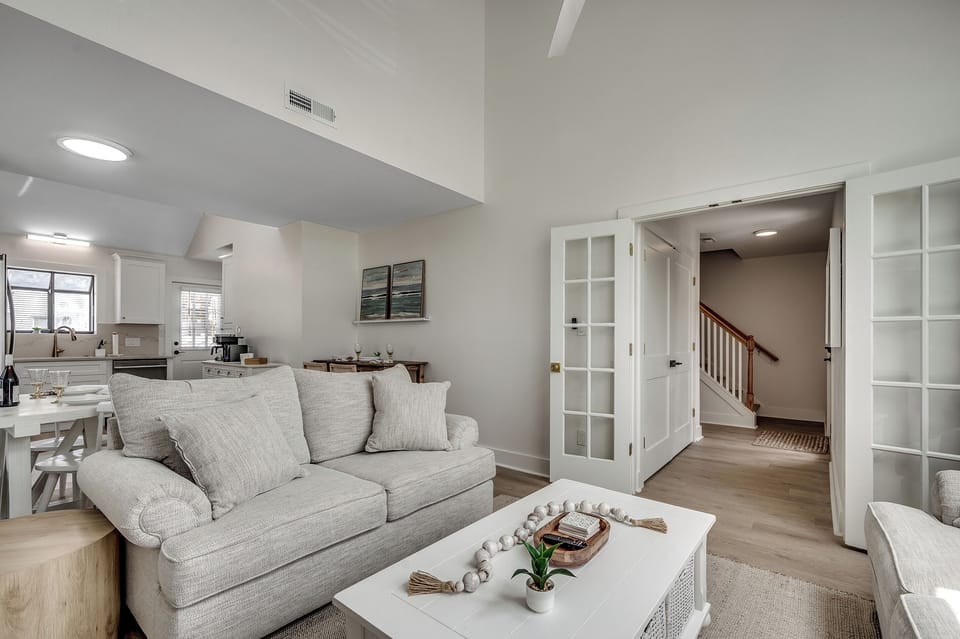 Cozy meets chic in this inviting living space—perfect for unwinding, entertaining, or just enjoying the flow to the kitchen and beyond.