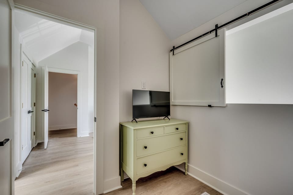 Loft lounging at its best! Enjoy your favorite shows on the TV with easy access right back into the bunk room for seamless chill time.