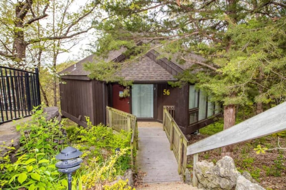Welcome to Treetop Villa 56! Your charming lakeside retreat nestled in the heart of the Treetop Village Ozarks.