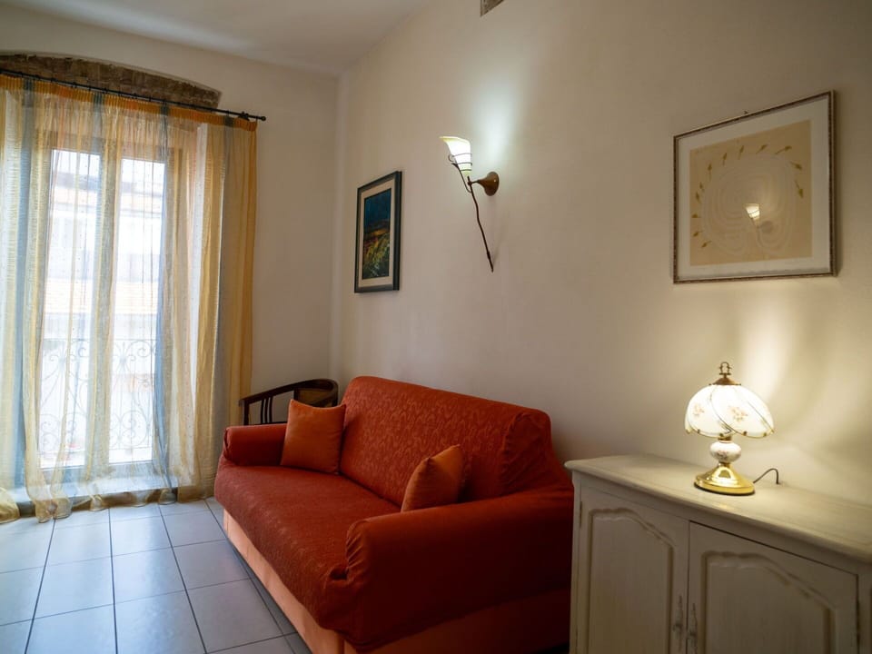 Furniture, Interior Design, Wall, Flooring, Wood, Floor, Couch, Room, Living Room, Lighting