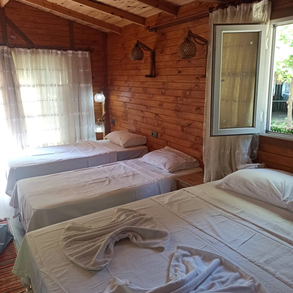 Family Tree House, Garden View | Blackout drapes, bed sheets
