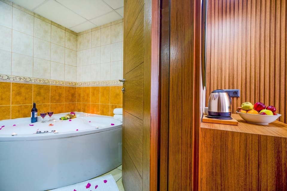 Shower, hydromassage showerhead, designer toiletries, hair dryer