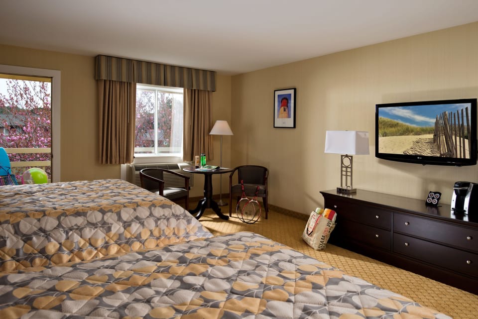 Deluxe Room, 2 Queen Beds | Iron/ironing board, WiFi (free), bed sheets