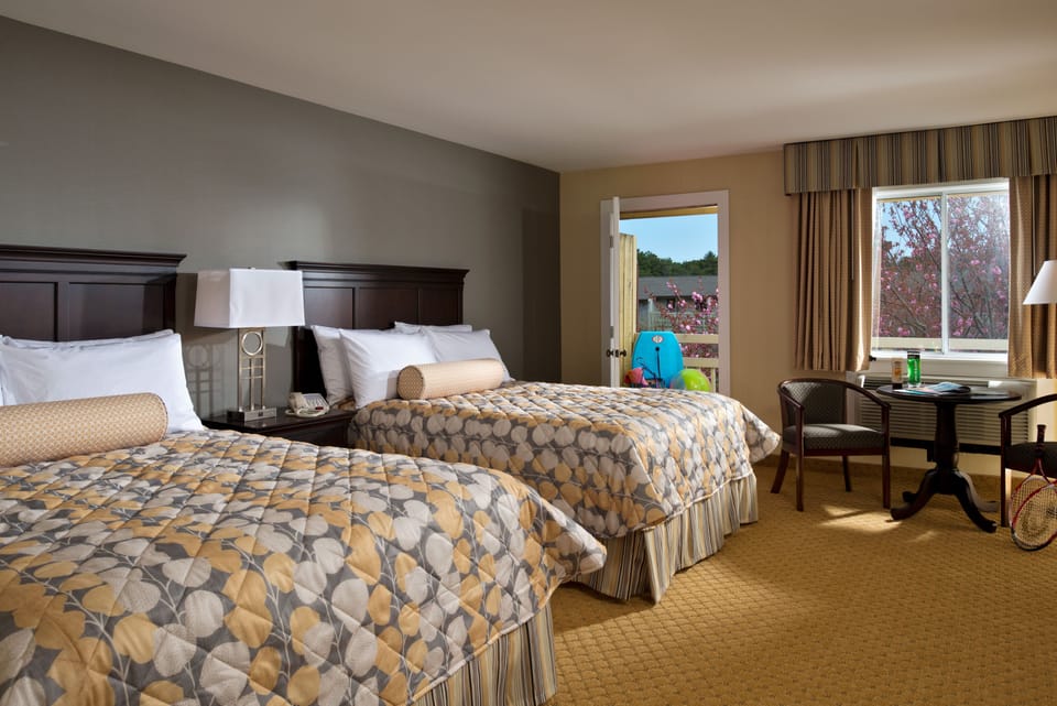 Deluxe Room, 2 Queen Beds | Iron/ironing board, WiFi (free), bed sheets