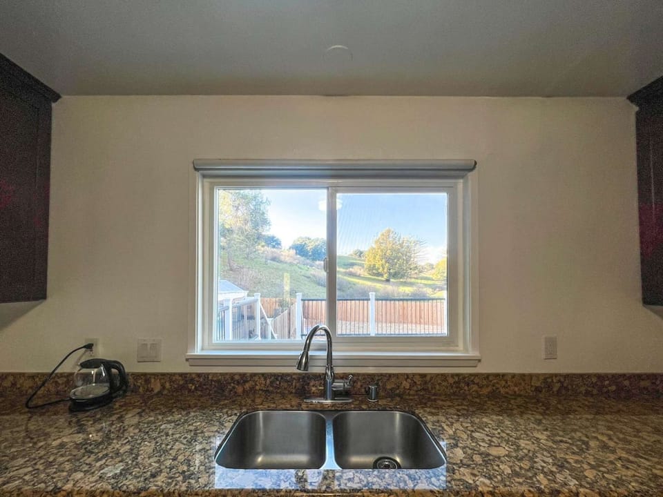 Premium finishes and a spotless sink — your perfect culinary corner