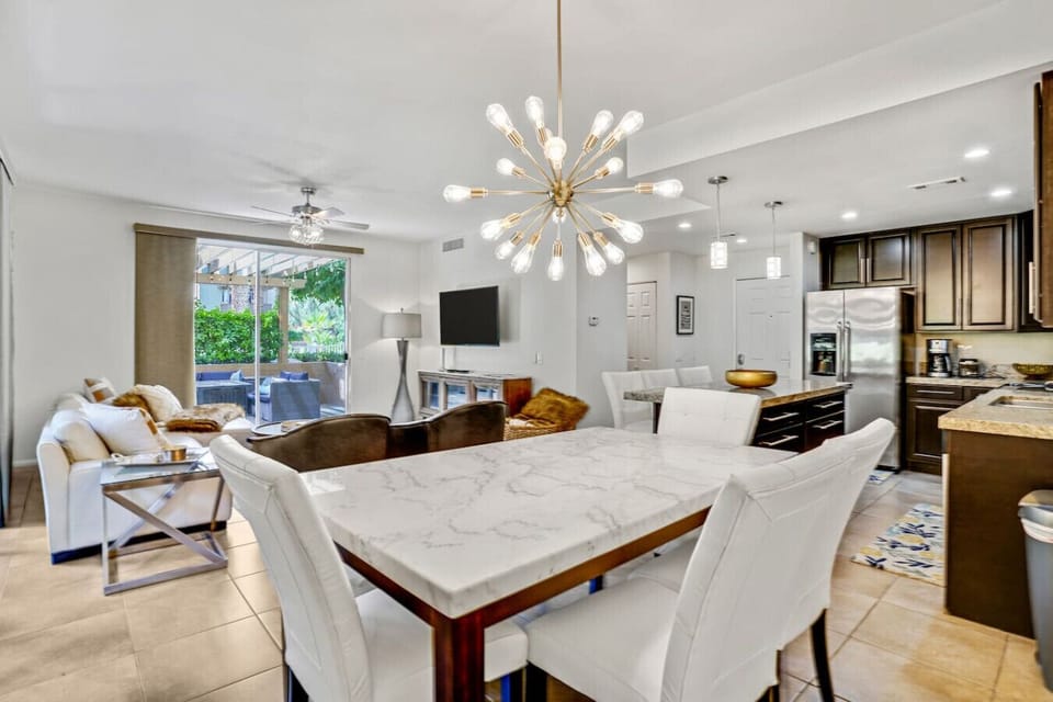 Enjoy meals or game nights at the cozy dining table just off the living room.