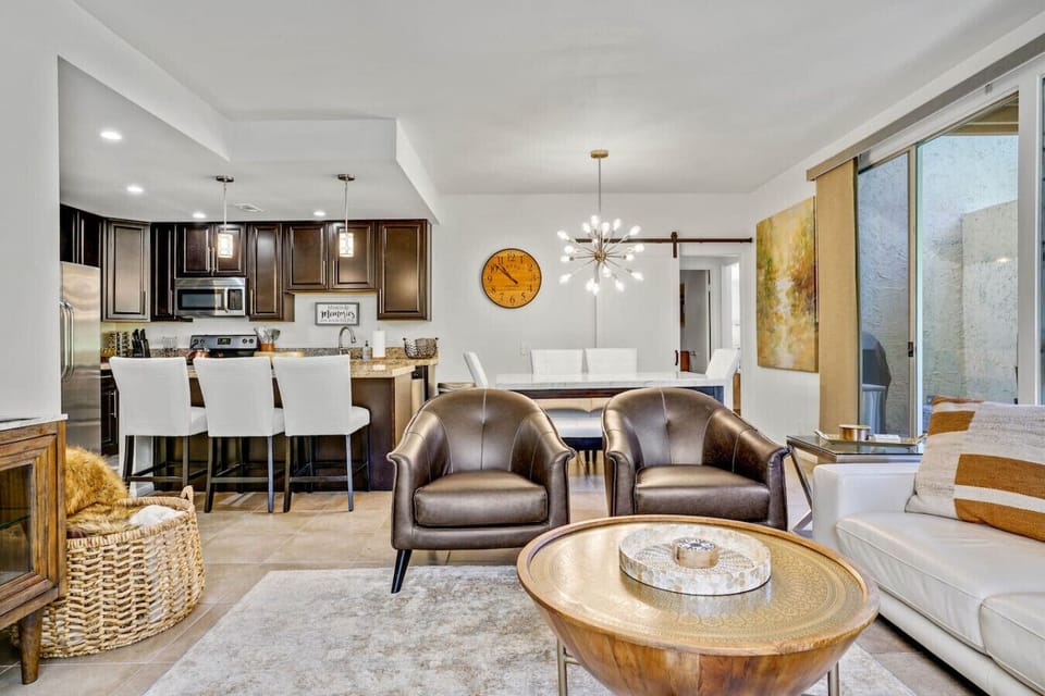 Dine in comfort with soft lighting and easy access to the kitchen and living room.