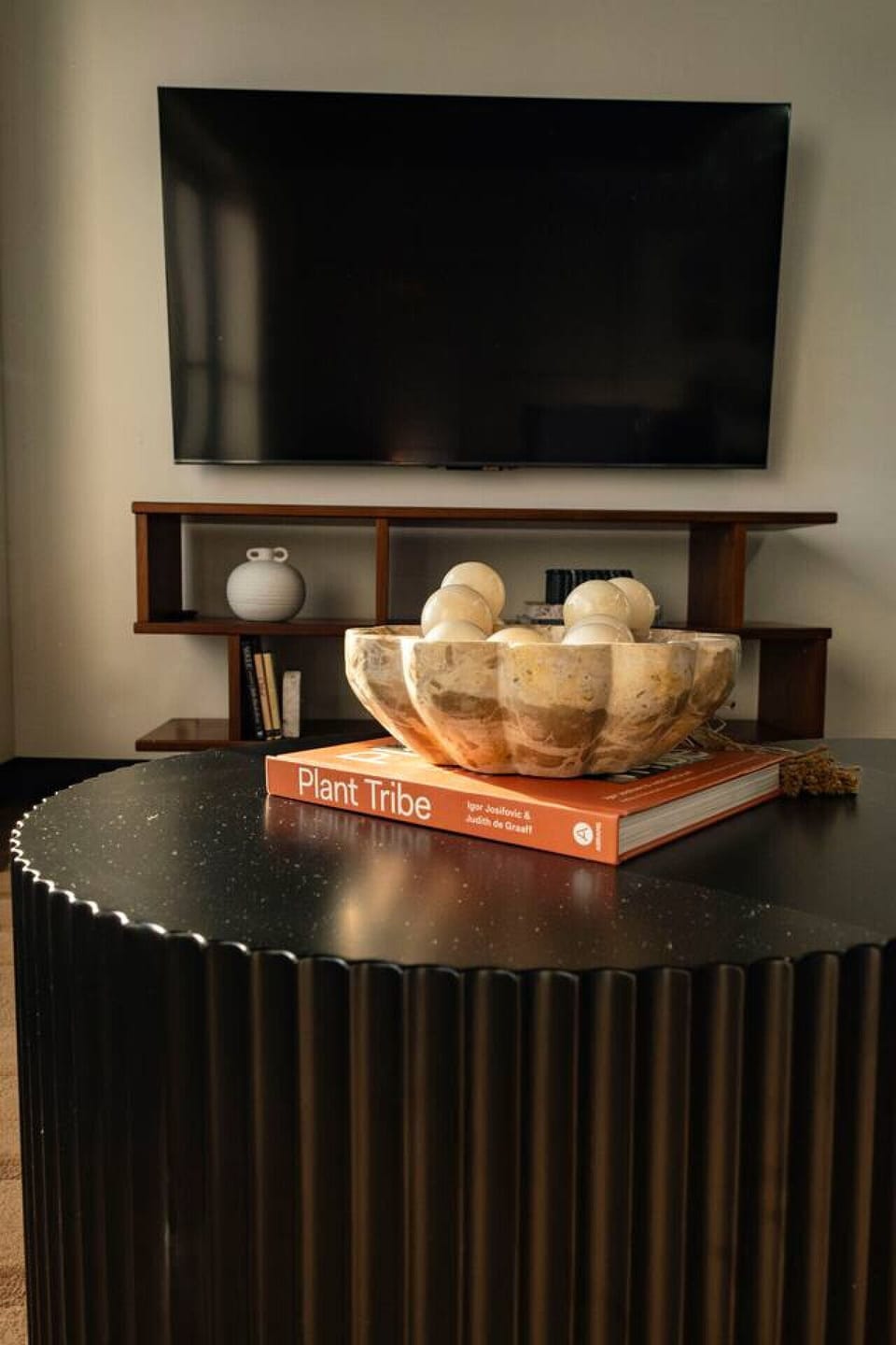 Bright and comfortable living space with Smart TV for easy entertainment.