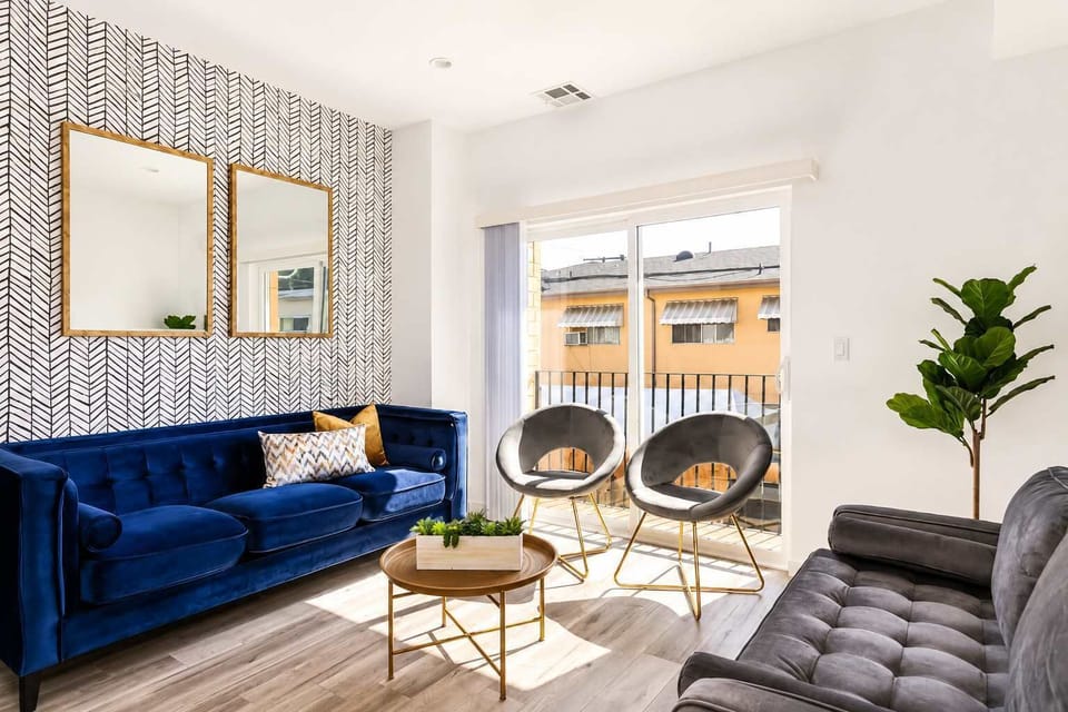 Stylish living room with comfortable seating and natural light.