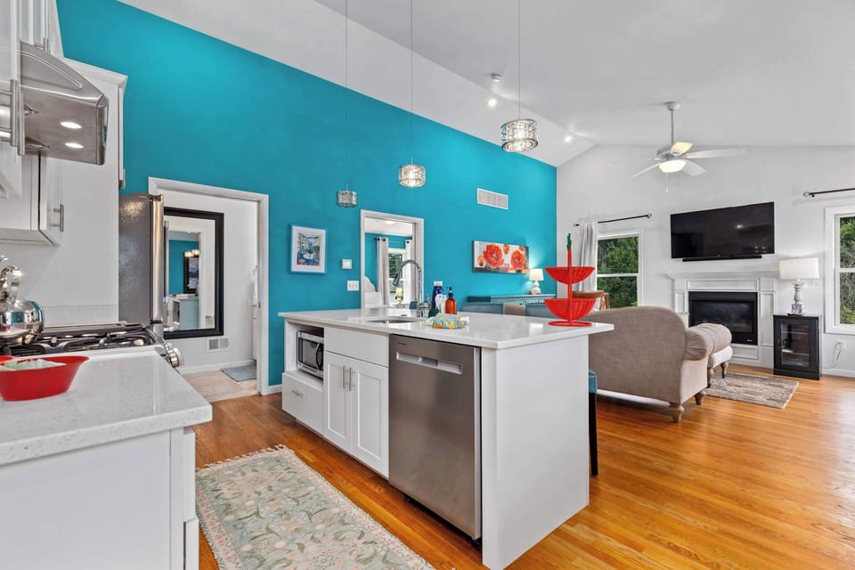 Open-concept kitchen flowing into the living area