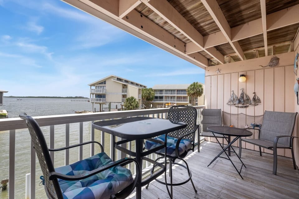 Private deck with seating and dining room