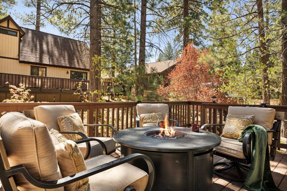 As dusk settles, the inviting glow of the firepit sets the scene for an unforgettable evening.