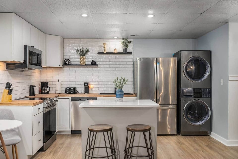 Fully equipped basement kitchen with full-size appliances—perfect for cooking meals, brewing coffee, or settling in like home.