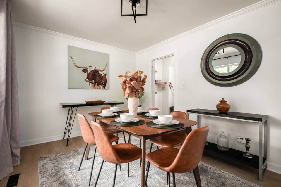 The dining area comfortably seats up to 8 guests—ideal for shared meals and special moments. (Longer table available, not pictured.)
