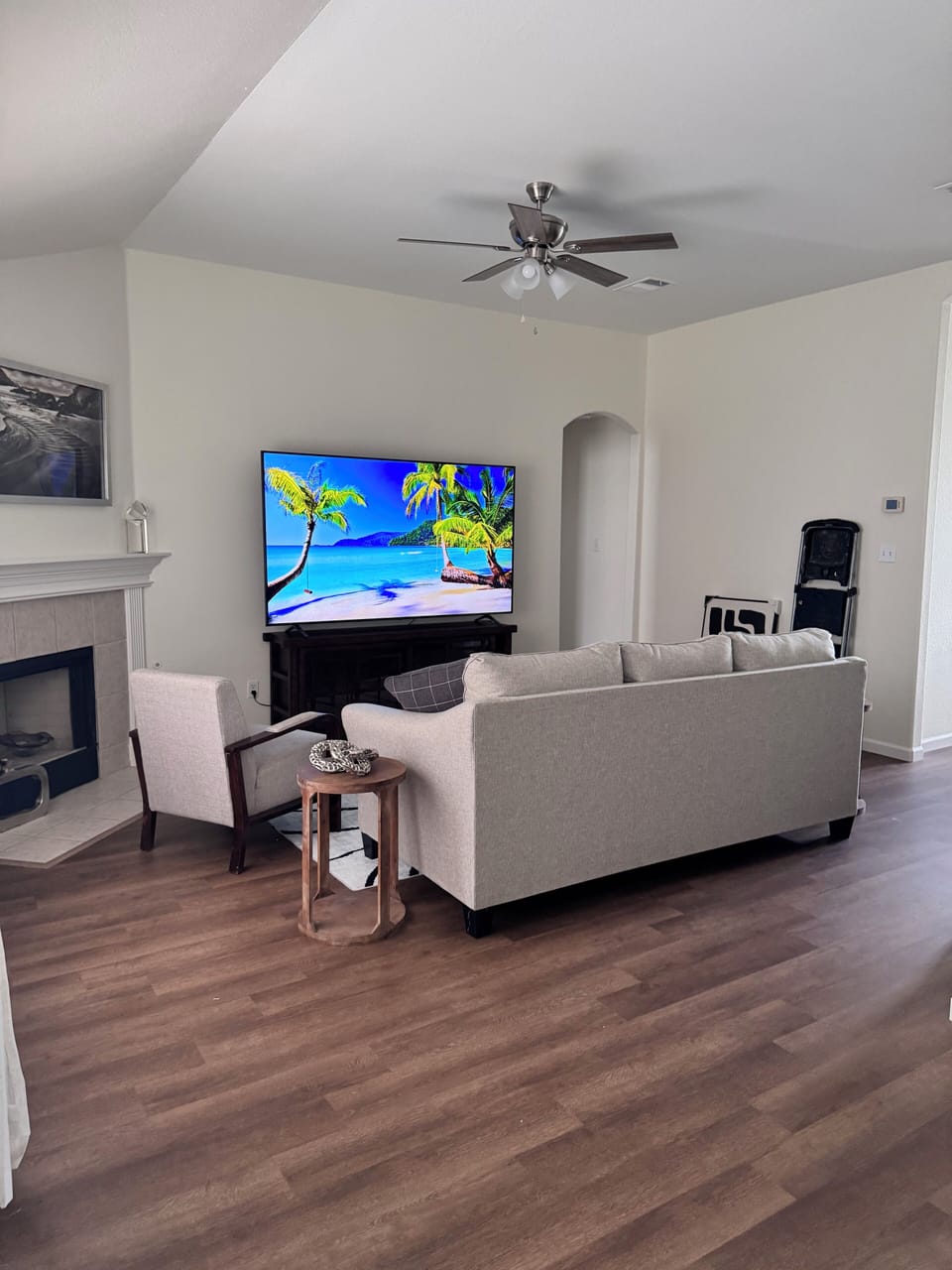 Open living room with a brand new 86" TV