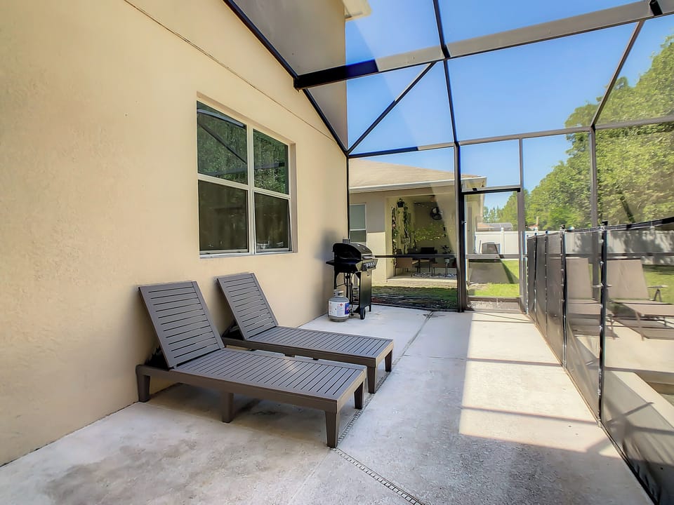 BBQ grill and loungers