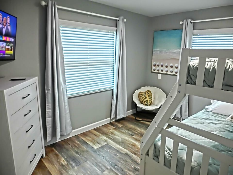 Guest Bedroom with Smart TV, Twin over Full, and Pull Out Twin Trundle