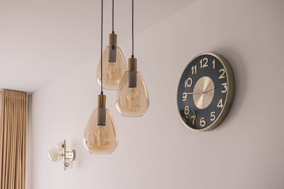 Stylish lighting and clock – designer touches throughout