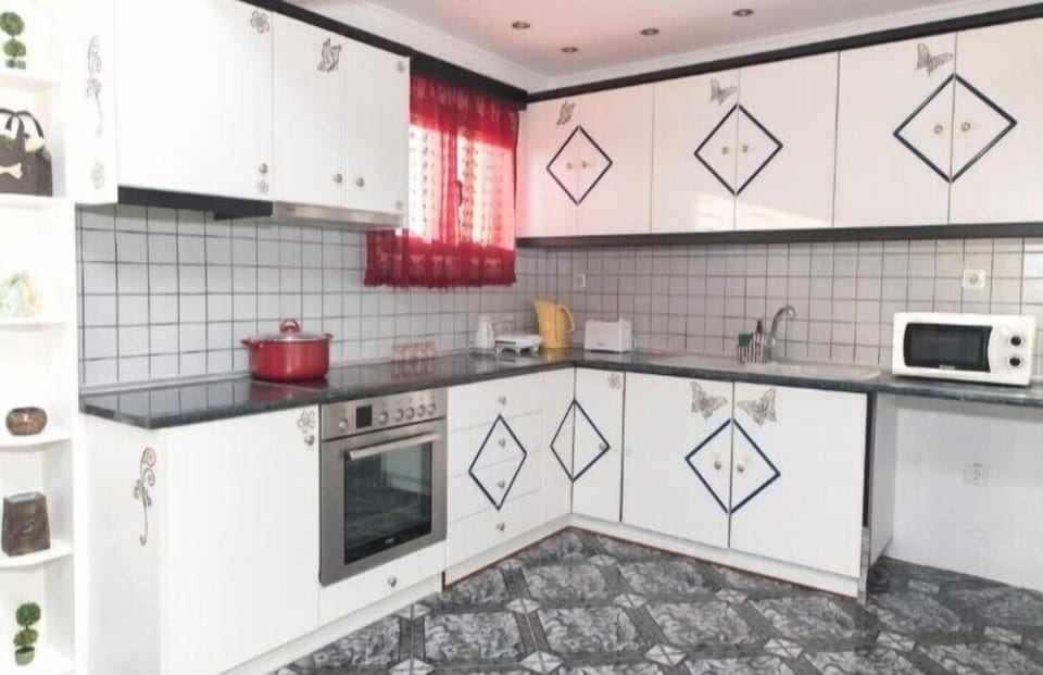 Basic Condo, Partial Sea View | Private kitchen | Coffee/tea maker, electric kettle, toaster