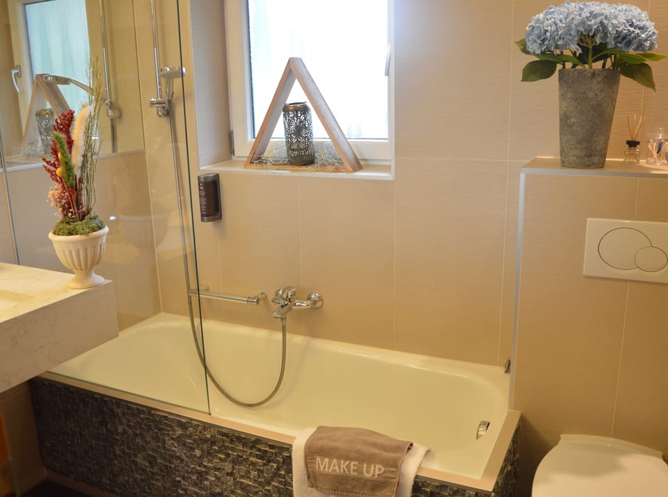 Deluxe Double Room, Balcony, Mountain View | Bathroom | Free toiletries, hair dryer, towels, toilet paper