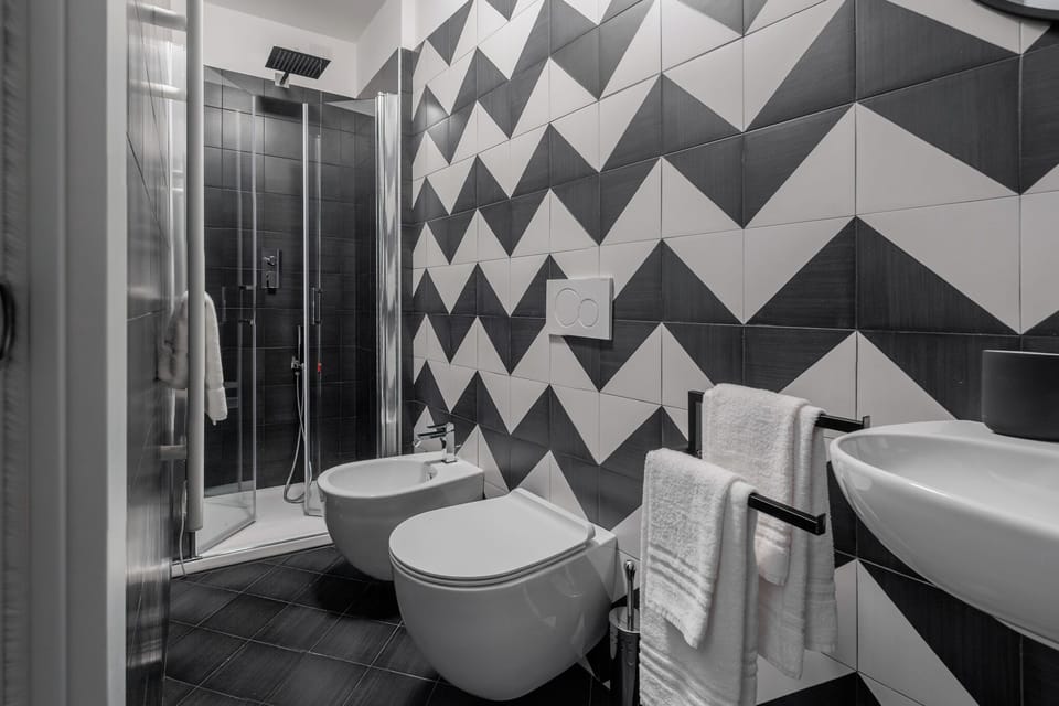 Deluxe Double Room, Private Bathroom, City View | Bathroom | Shower, free toiletries, hair dryer, towels