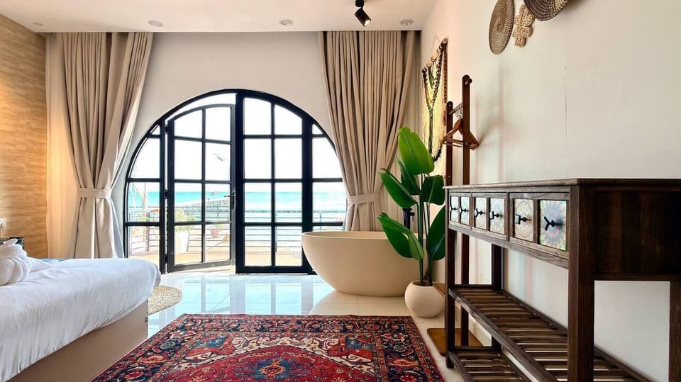 Deluxe Double Room, 2 Bedrooms, Sea View, Beachfront | Premium bedding, desk, laptop workspace, free WiFi