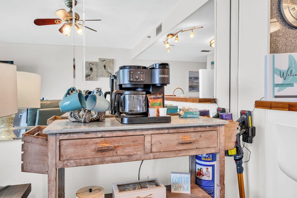 Start your morning perfectly with this charming coffee station, complete with premium Keurig and everything you need for the perfect brew.