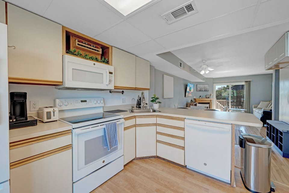 The stocked Kitchen will delight the Chef in your Family with all the conveniences of home!