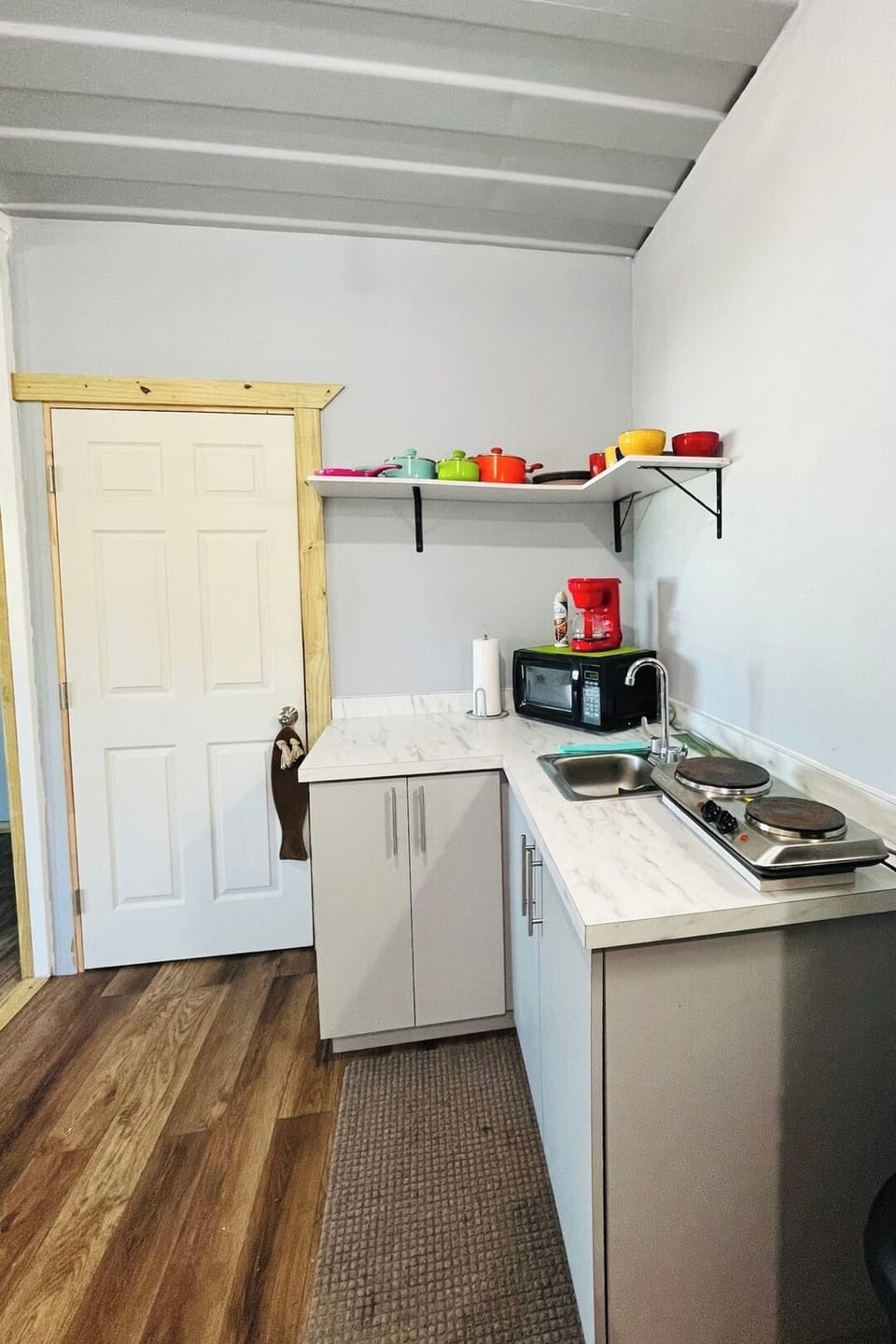 Our kitchen is fully equipped with small stove, pots & pans, utensils, dinnerware, coffee pot, fridge and everything you need to cook up some fun! 